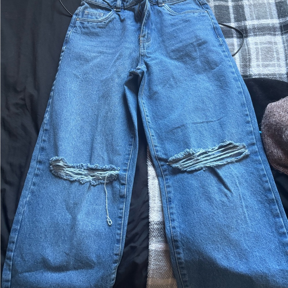 Distressed Blue Jeans
